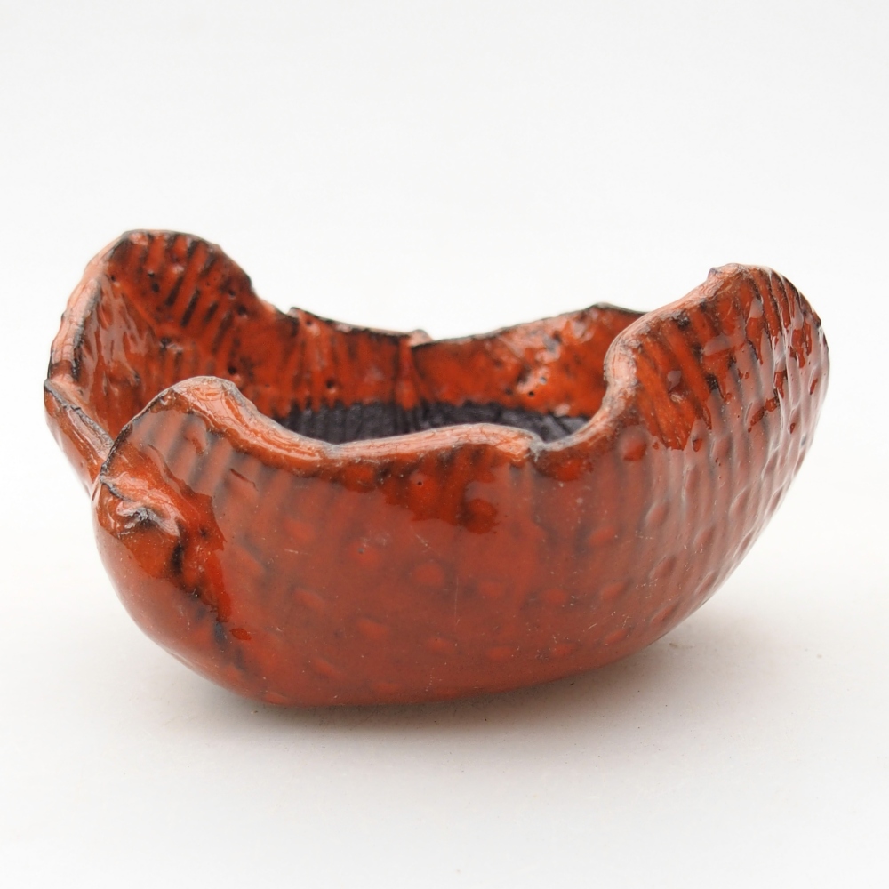 Concha de cerámica 8,5 x 8,5 x 5 cm , color naranja