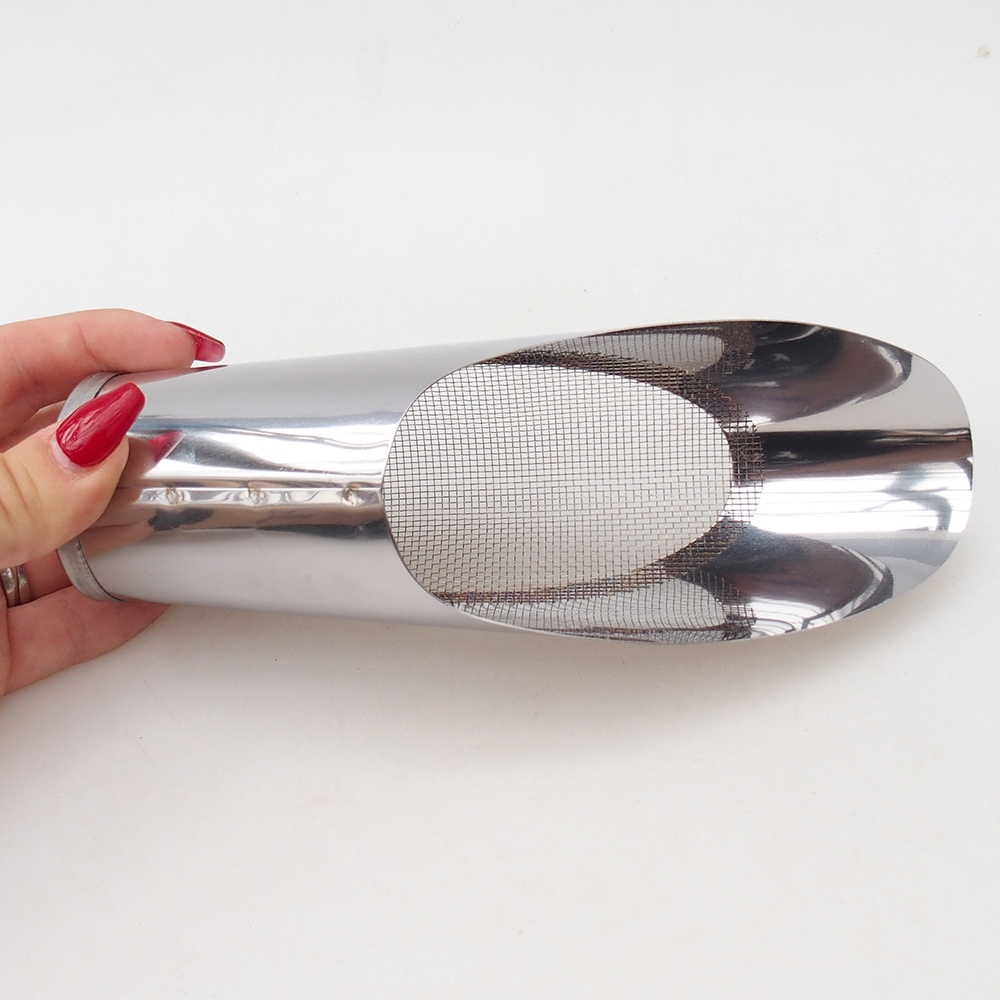 Pala de tierra con tamiz