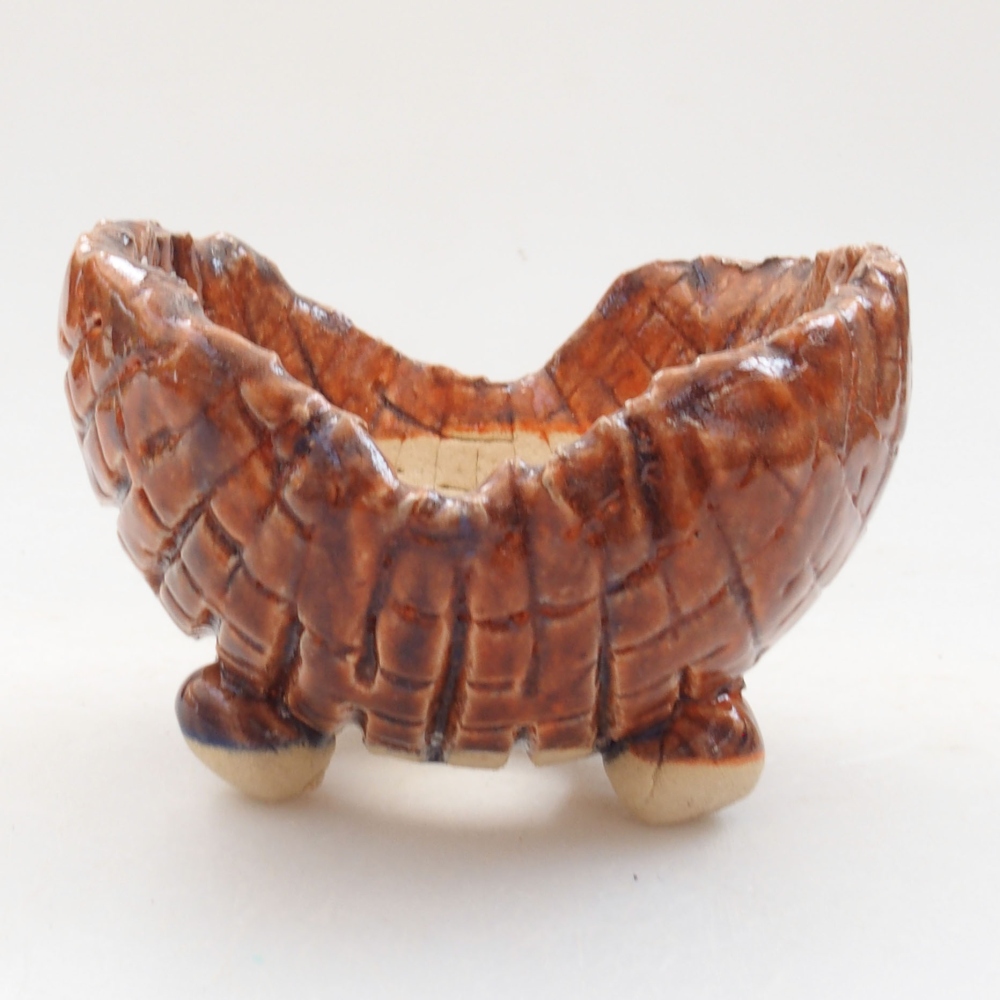 Concha de cerámica 7,5 x 7 x 6 cm , color marrón