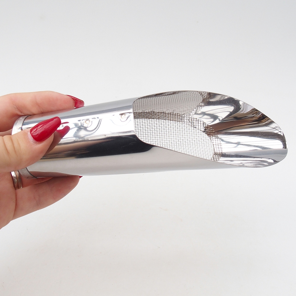 Pala de tierra con tamiz