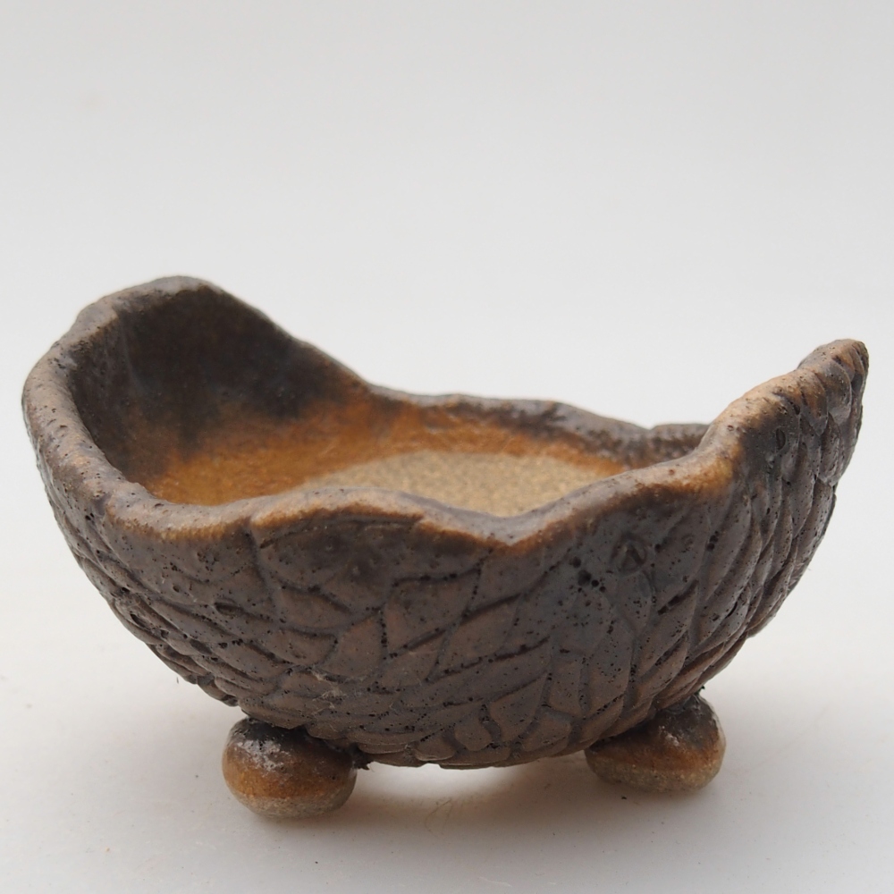 Concha de cerámica 8,5 x 8,5 x 7 cm , color marrón