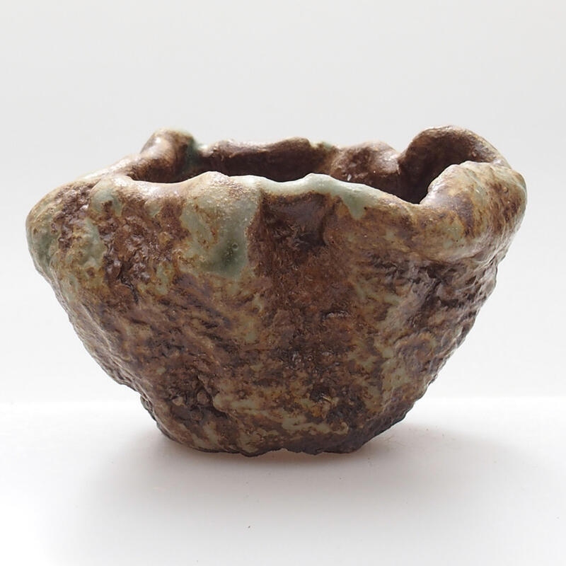 Concha de cerámica 6 x 5 x 5 cm , color verde-marrón