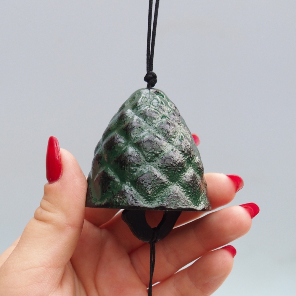 Campana de metal, color verde